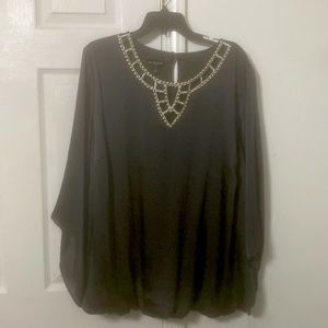 Dark gray blouse. Mid sleeve. Bedazzled neck line. Size 3x. with tags.